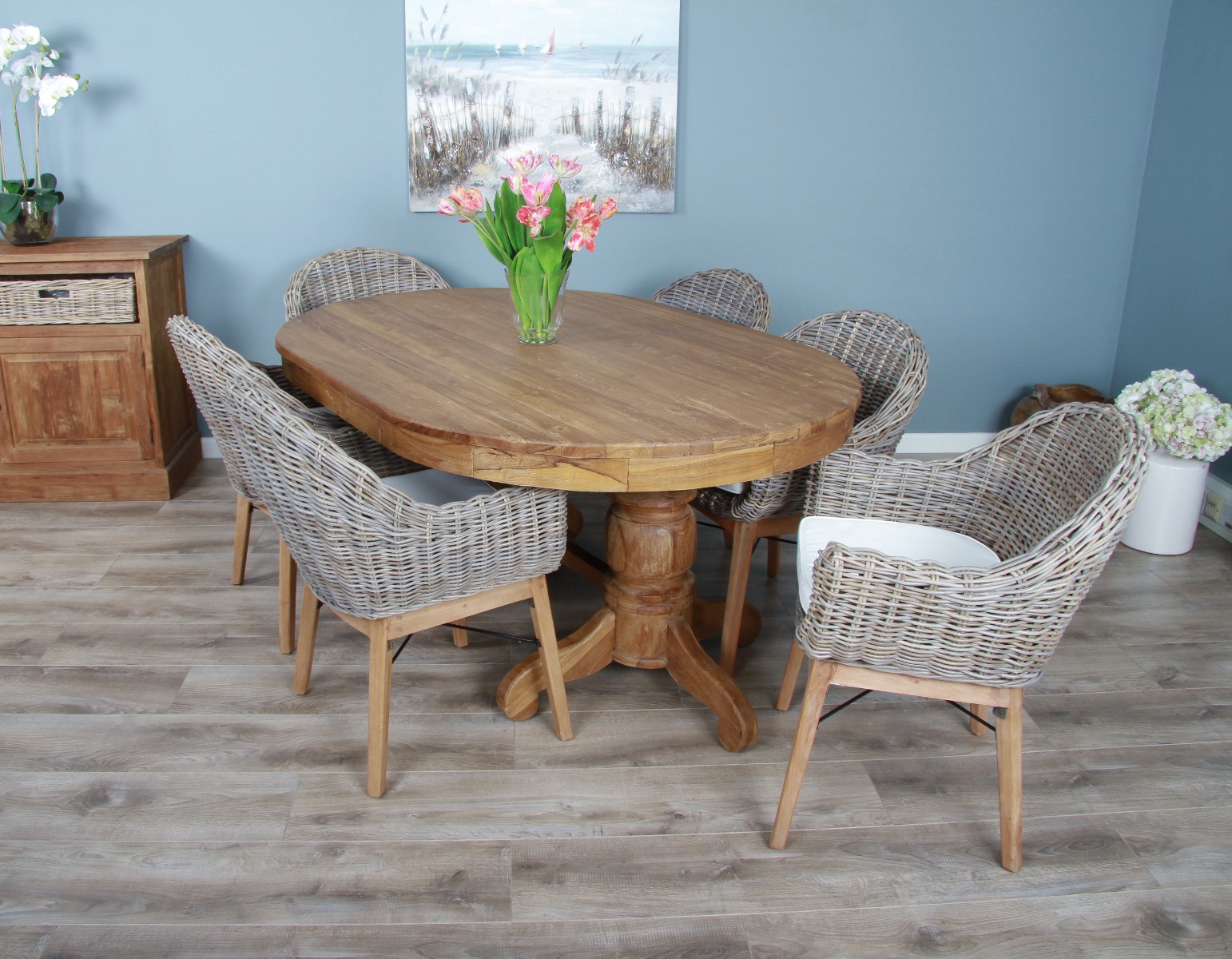 Round to oval store pedestal dining table