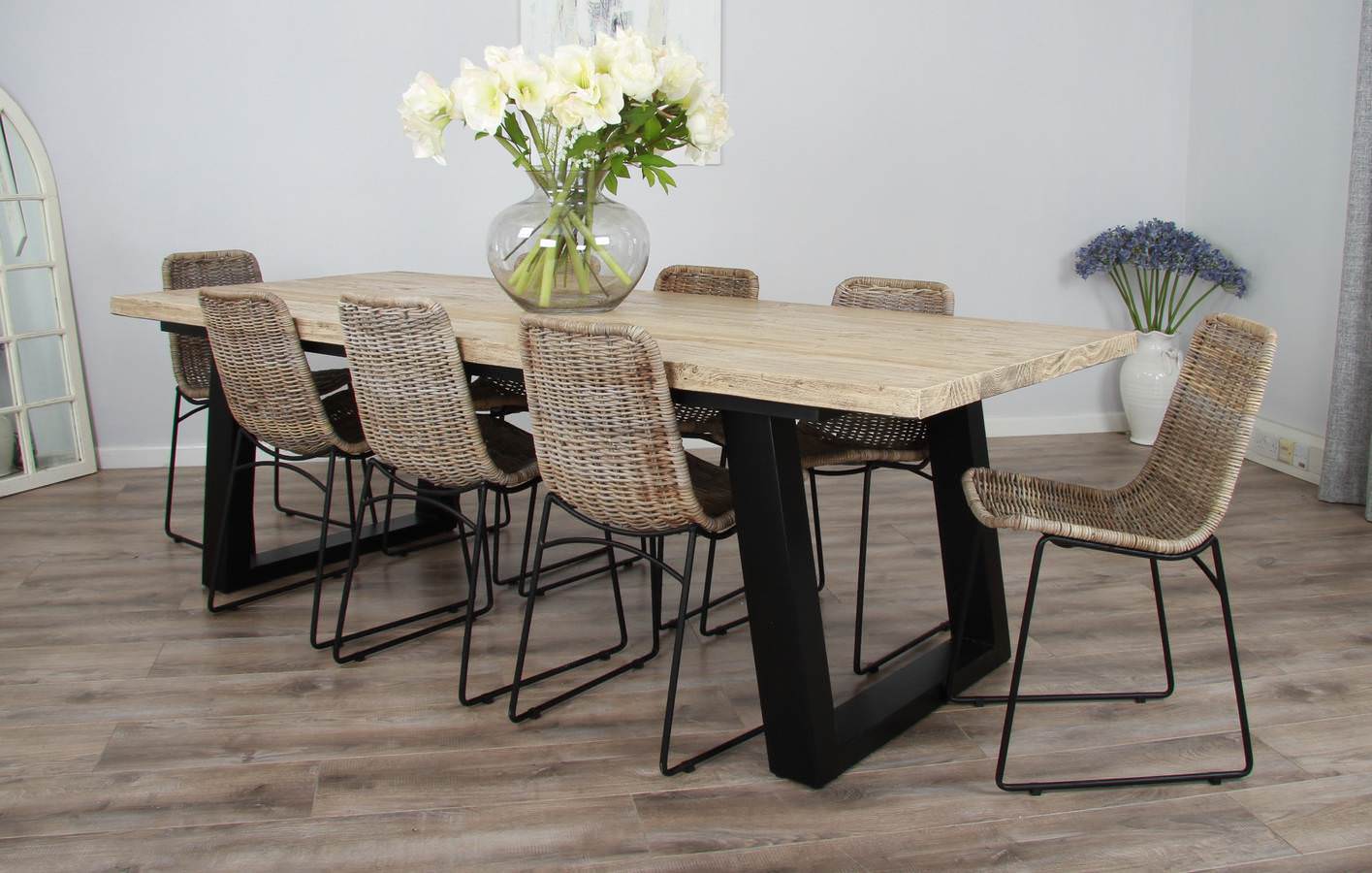 Black chairs and wood table discount