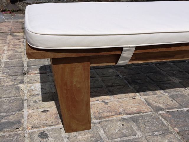 Outdoor backless bench with cushion outlet